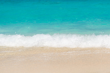 Fototapeta na wymiar wave on the beach in sunshine day , Andaman sea