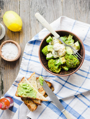 Winter vegetable salad with broccoli and cauliflower, toast with