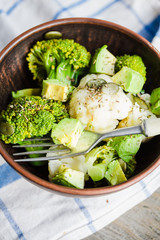 Winter vegetable salad with broccoli and cauliflower, toast with