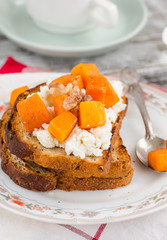 homemade sandwich with caramelized pumpkin, cheese and nuts, bre