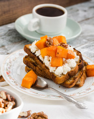 sweet toast with caramelized pumpkin, cheese and nuts, breakfast