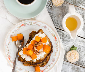 sweet toast with caramelized pumpkin, cheese and nuts, breakfast