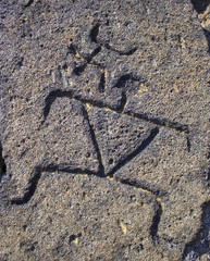 Petroglyph Rock Carving of Human Forms in Hawaii