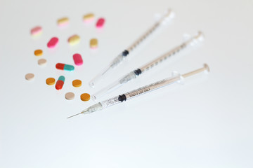 colorful drug and syringe insulin for diabetes patient and vacci