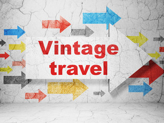 Travel concept: arrow with Vintage Travel on grunge wall background
