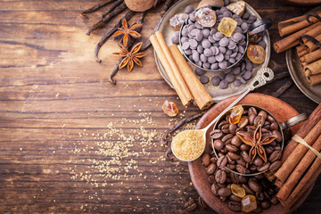 Coffee beans, chocolate drops, vanilla pods, cinnamon sticks, anise stars and brown sugar