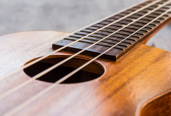 Obraz premium Close up of ukulele on table