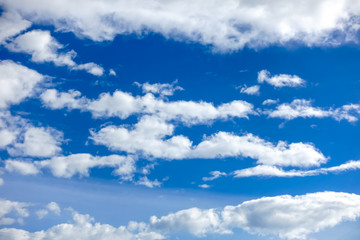 Naklejka na ściany i meble Blue sky with tiny clouds