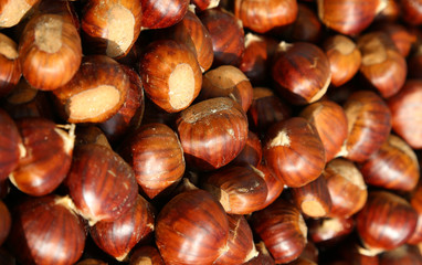 many chestnuts roasted on the fire from a street vendor on the r