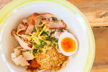 Asian red pork noodle with egg soup