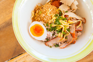 Asian red pork noodle with egg soup