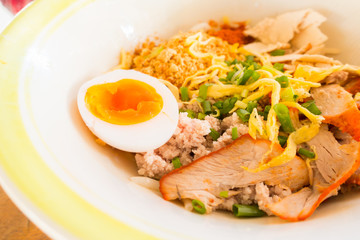 Asian red pork noodle with egg soup