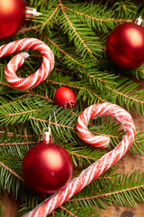 Christmas tree branch, candy, cones, balls