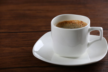 Cup of coffee on table close up