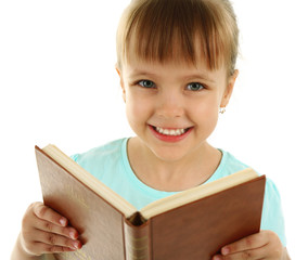 Beautiful little girl with book, isolated on white