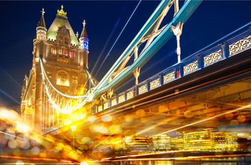 Night view of Tower bridge with traffic lights reflections