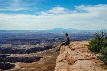 Male Hiker Overlooking Grand View in Canyonlands