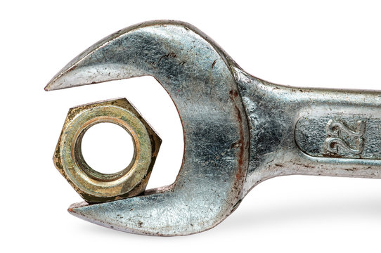 Closeup an old wrench and nut