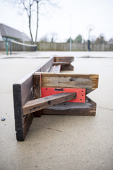 Overturned courtside bench