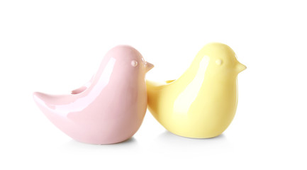 Two toy birds, isolated on white