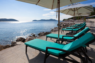 loungers and sunshades at the beach