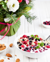 Oats with berries at breakfast time