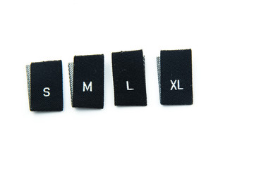black fabric clothing size labels