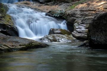 Fototapeta premium creek flowing over the rocks