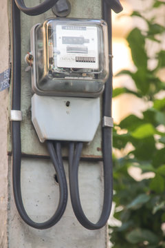 Outdoor Single Phase Inductive Kilowatt Hour Meter On Concrete Pole, Energy Meter, Electric Power Meter, Kwh Meter Or Counter Meter.