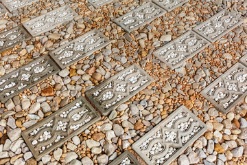 Walkway surface made of gravel grainy , stone and bricks for bac