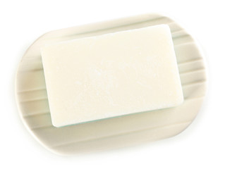 Soap on a dish, isolated on white
