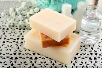 Soap set on a lace background, close up