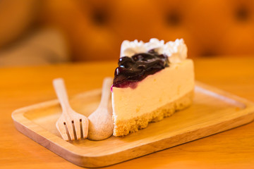delicious sweet blueberry cheese cake on wooden