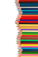 Mixed arranged of colours wooden pencils on white background