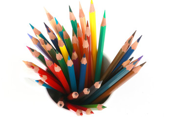 Mixed arranged of colours wooden pencils on white background