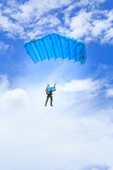 Parachute on blue sky