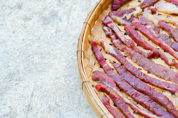 Dried meat in threshing basket