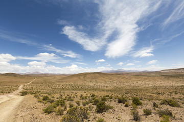 Fototapeta na wymiar 4x4 track in the mountains of Eduardo Avaroa Reserve, Bolivia