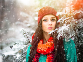Beautiful young girl enjoy in winter park