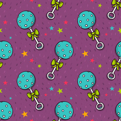 Vector seamless pattern with cute rattle and stars