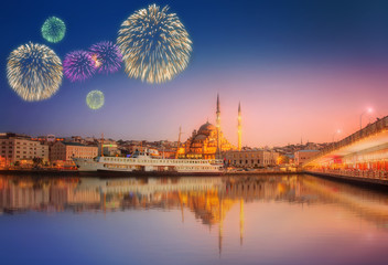 Fototapeta premium Panorama of Istanbul at a dramatic sunset with fireworks