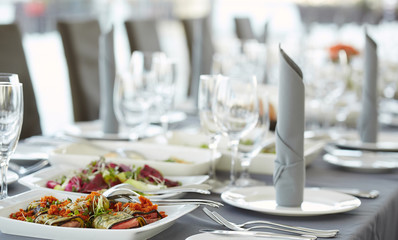 Different meals and snacks on a table.