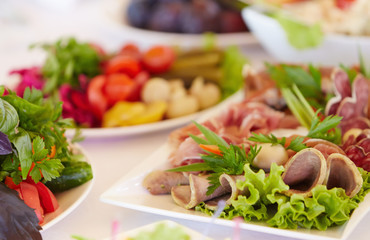 Different meals and snacks on a table.