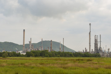 Oil refinery among grass