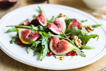 Fig with Pomegranate and rocket salad