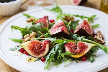Fig with Pomegranate and rocket salad