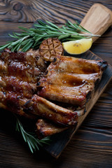 Closeup of roasted pork ribs, selective focus, studio shot