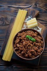 Top view of ingredients for spaghetti bolognese, studio shot