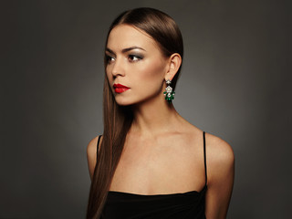 beautiful young woman in a jewelry.luxury beauty brunette girl with red lips