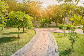 Keuken spatwand met foto Brick block jogging track in the garden with sunlight © ukimurakung